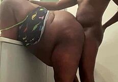 Ebony babe enjoys a quick hardcore fuck in the bathroom with monster cock