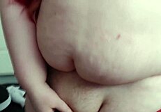 Chubby Shemale Teases with Closeup Tit Play