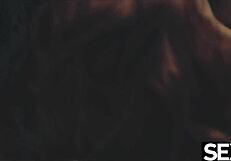 Does this lesbian redhead make her girlfriend's big tits bounce with licking?