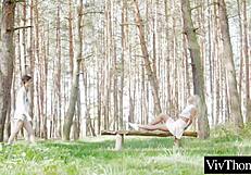 Sexy Blonde and Hot Brunette Kiss in Forest Before Indoor Intimacy