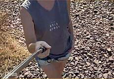 Wife dares to flash big tits in public with ripped shirt for exhibitionist thrill