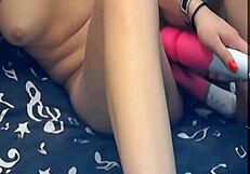 the girl feels pleasure with two vibrating dildos