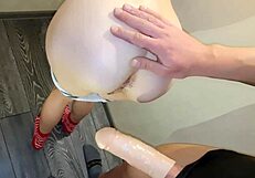 Small stepsister gets a lot of pleasure with a big cock in a condom