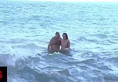 does this brunette's shaved pussy get fingered at seaside?