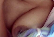 Sexy latina masturbates her wet hairy pussy on bed.