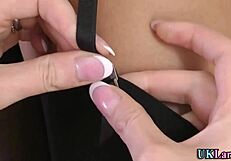 Hey, wanna see this British milf finger in stockings?