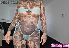 Melody Radford in a sheer micro bikini in a rather obvious pose