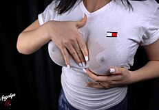 Big-breasted woman gives a wet blowjob in a tight t-shirt