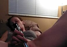 Redhead enjoys solo masturbation with toys
