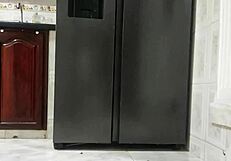 Amateur video of a Latina woman with a big ass in the kitchen