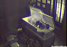 Couple caught on hidden cam banging hardcore in coffin