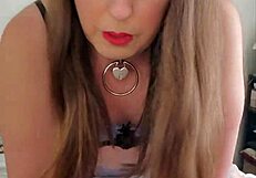 Brunette transsexual in crossdressing attire rides a pillow solo in detailed scene