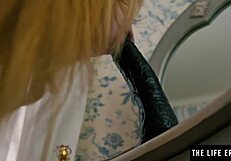 blonde in fishnets rides her huge black dildo doggy