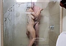 Gay couple has sex in a hotel bathroom and sucks the sperm from the shower stall