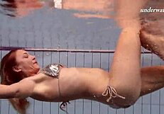 Iva brizgina shows her ass in the pool