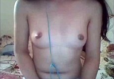 Linh teases with pink charm on webcam