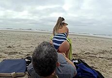 A woman gives a blowjob and an anal sex in public to a couple of strangers