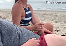 A woman gives a blowjob and an anal sex in public to a couple of strangers