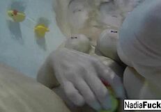 Nadia White’s sensual solo bath time with rubber ducks and self-pleasure