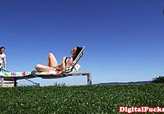 Glamour milf enjoys poolside chat in bikini with friends