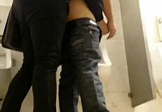 Intriguing gay sex encounter happening in the second toilet.