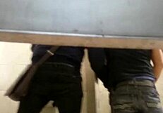 Intriguing gay sex encounter happening in the second toilet.