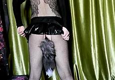 Is this cute ladyboy in latex moaning during solo play?