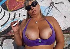 hot milf goin crazy masturbatin on beach... damn