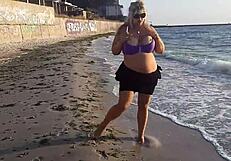 hot milf goin crazy masturbatin on beach... damn