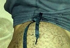 Gay twink jerks his big hairy cock solo?