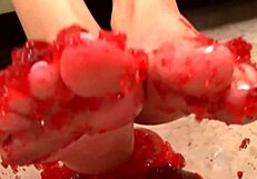 A lucky guy gets a footjob, handjob, and blowjob