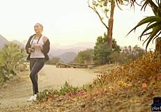 Naturally curvy blonde milf babe taking selfies outdoor