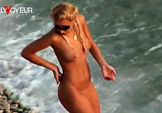 Wow! Check This Gorgeous Blonde Babe Riding Her Man on a Public Beach!