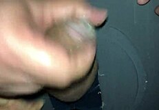 Guy jerks through glory hole at swing house