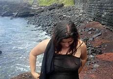 Is My Stepmom Seducing Me on This Public Beach?