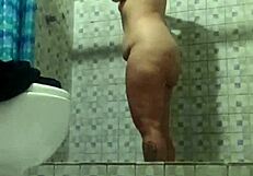 Hidden Camera In Shower Spying On Mature Stepmother?