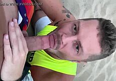 Watch the gay blowjob on the beach