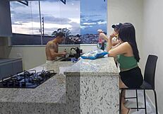 Young housewife gets pounded in the kitchen by a stud