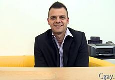 gay guy enjoys large pecker in porn scene.