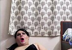 Shemale Monica's solo session in fishnets and stockings
