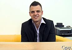 gay guy enjoys large pecker in porn scene.