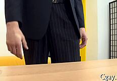 gay guy enjoys large pecker in porn scene.