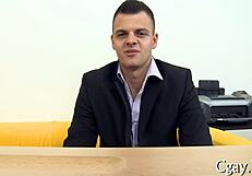 gay guy enjoys large pecker in porn scene.