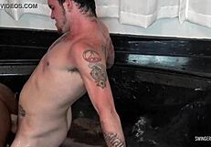 Ebony beauty enjoys pussy drilling in interracial swingers threesome. Tattooed and hardcore.