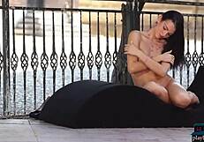 Petite brunette Sapphira's public striptease and bare pussy