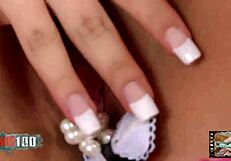 Tiny Asian beauty Mitsuki Sweet undressing on the bed
