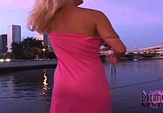 Beautiful blonde Alanna shows off her big boobs and pees outdoors