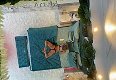 Monika fox poses naked on the bed.