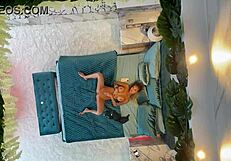 Monika fox poses naked on the bed.