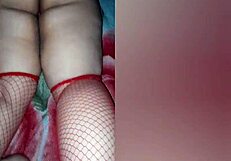 Red lingerie and a bent over pose for a steamy scene
